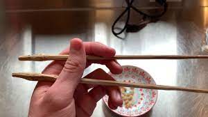Your left hand should be supporting them in the middle. How To Use Chopsticks Left Handed Youtube