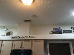 If your kitchen ceiling is flat, it probably has one or more light fixtures mounted to it's surface. I Have A 90s Drop Down Soffits In My Kitchen How Do I Update It Hometalk