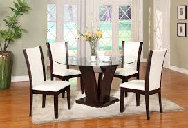 Surface scratches to glass top. Manhattan 5pc Dining Table
