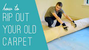 how to rip out an old carpet you