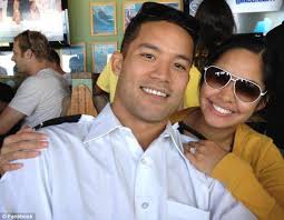 Tragic: Jonathan Jake Tenorio, pictured left with new wife Christine Santos, was found dead and covered in blood in his San Diego apartment on Sunday ... - article-2270131-173BE7EB000005DC-633_634x492