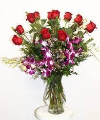 A bouquet of elegant white roses on valentine's day typically sends a message of loyalty to the recipient. Flower Meanings For Valentine S Day Central Square Florist Central Square Florist