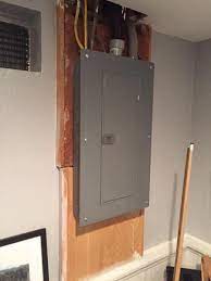 A Cabinet Over An Electrical Panel