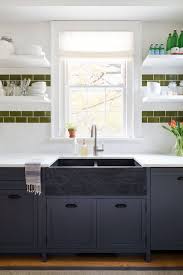 Check out our white black and blue kitchen decor selection for the very best in unique or custom, handmade pieces from our shops. 21 Black Kitchen Cabinet Ideas Black Cabinetry And Cupboards