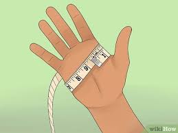 Use a tape measure to find the circumference of the widest part of your hand in inches, and don't include your fingers in the measurement. How To Size And Take Care Of Goalkeeper Gloves 13 Steps