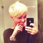 The dark brown hair color will give the perfect look for. Miley Cyrus Debuts New Short Haircut Ew Com