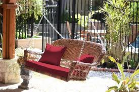 Honey Resin Wicker Porch Swing With Red