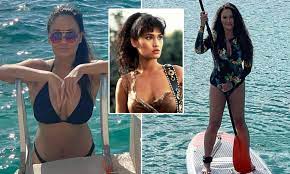 Wayne's World star Tia Carrere showcases fit frame in a bikini for 56th  birthday and the New Year 