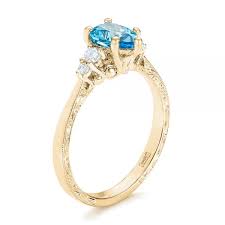 18k yellow gold custom blue topaz and diamond enement ring