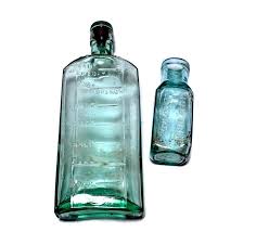 Two Aqua Glass Antique Bottles Cataline