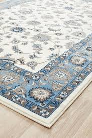 white rug light blue border carpet