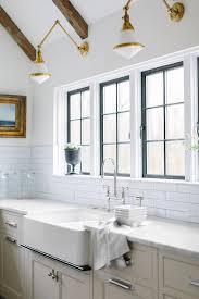 White Glass And Brass Swing Arm Kitchen Sconces Transitional Kitchen