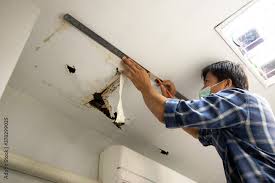 fixing ceiling panels damaged hole