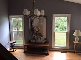 hang large artwork between two windows