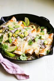 Pour enough soup mixture into a 9 x 13 pan to coat bottom. Sour Cream And Green Chile Chicken Enchiladas The Defined Dish