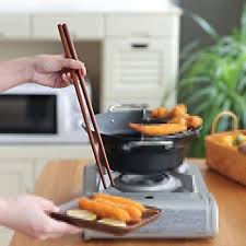 When you are not using your chopsticks, or have finished eating, lay them down in front of you with the tips to left. Amazon Com Cooking Chopsticks Wooden Noodles Kitchen Chopsticks For Hot Pot Frying Cooking Noodle Extra Long Set Of 3 Pairs 15 Inch Flatware