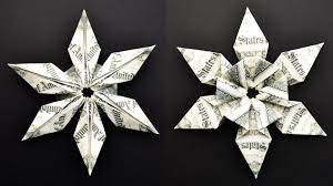 Designs such as christmas trees with a little tweaking, you can adapt the classic origami lucky star model so it can be folded out of paper currency. Money Star Origami Dollar Tutorial Diy Christmas Decoration Idea Youtube