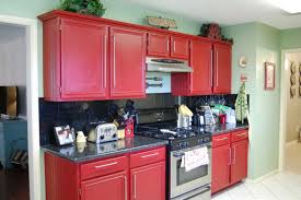 Original 1956 kitchen with gray steel cabinets, aqua countertops, and original flooring. Red And Yellow Kitchen Interior Design Inspirations