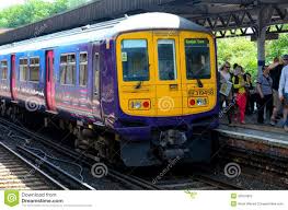 british commuter train at station in