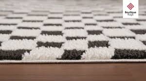 lajos black white checd area rug