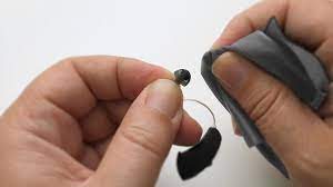 Gently brush the hearing aid clean. How To Clean Hearing Aids More Maintenance Tips Interton