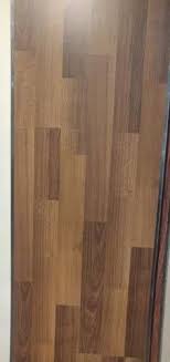 brown engineered wooden flooring for