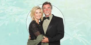 The grease star showed off the marijuana plants that help treat the pain — and even slipped on her. Olivia Newton John And Husband John Easterling On Fighting Cancer With Cannabis