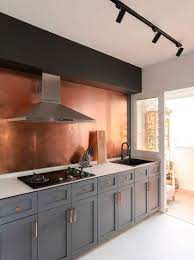 Copper backsplashes come in a variety of designs. 15 Copper Kitchen Backsplash Ideas That Make A Splash In 2021