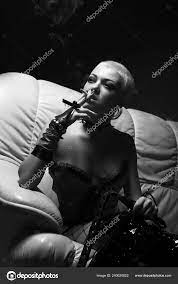 Fetish woman smoking Stock Photo by ©kanareva 240620822