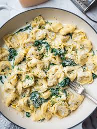 spinach and creamy wine sauce