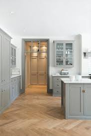 flooring with grey cabinets in kitchen