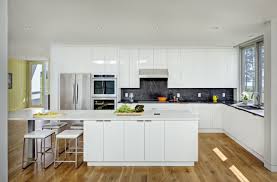 75 white kitchen with black backsplash