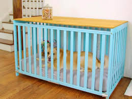 upcycle an old crib into a dog crate