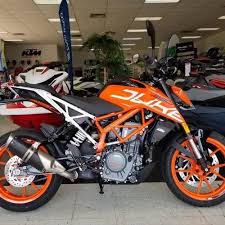 orange black ktm duke 390 bike at rs