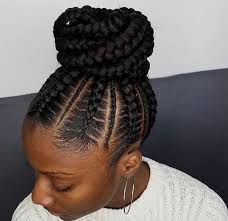 Portrait of beautiful happy black woman with braided hair. Updos For Black Hair Best Updo Hairstyles For Black Women January 2021