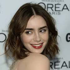 She is the daughter of british music icon . Lily Collins Aktuelle News Infos Bilder Bunte De