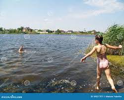 Children Bathe in the River Stock Image 