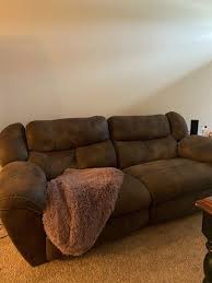 used brown electric recliner couch in