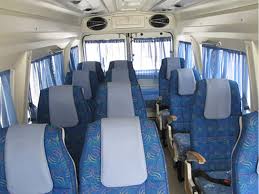 13 seater tempo traveller on