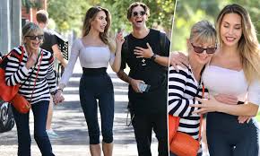 Hopelessly devoted to you, about her life, starring fellow cancer survivor and singer delta goodrem, she has vowed never to watch it. Olivia Newton John 71 Beams As She Proudly Supports Daughter Chloe Lattanzi At Dwts Rehearsals Daily Mail Online