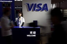 US banks to see modest hit from deal to lower swipe fee by Visa, Mastercard  | Reuters