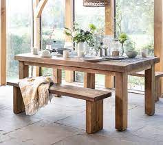 Get more bang for your buck with banquette seating on one side of your dining table. Chopwell Rustic Wooden Dining Table And Benches