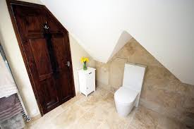 timeless loft bathroom with sloped