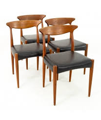 Some specific models of these mid century modern dining chairs leather are covered with fabrics that give them ravishing looks. Arne Olsen Danish Mid Century Teak And Leather Dining Chairs Set Of 4