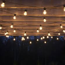hang outdoor string lights on garden