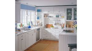 This small kitchen is given an element of spaciousness by the glass doors and white hues of the wooden cabinets and drawers. 10 Cabin Kitchen Cabinet Styles
