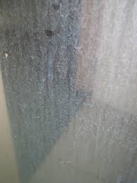 mark stains on a shower glass door