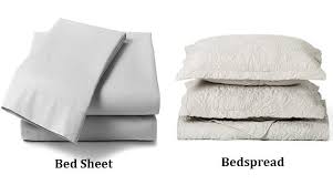 a bed sheet and a bedspread