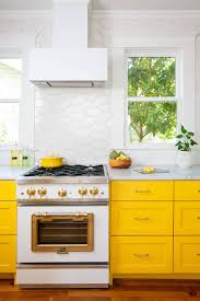 75 kitchen with yellow cabinets and