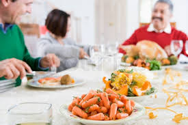 We've got all the recipes you need for the ultimate christmas dinner this year including some classics like yorkshire puddings, honey roast parsnips and not forgetting the main event, the christmas turkey. A Latin American Family Enjoying Stock Image Colourbox